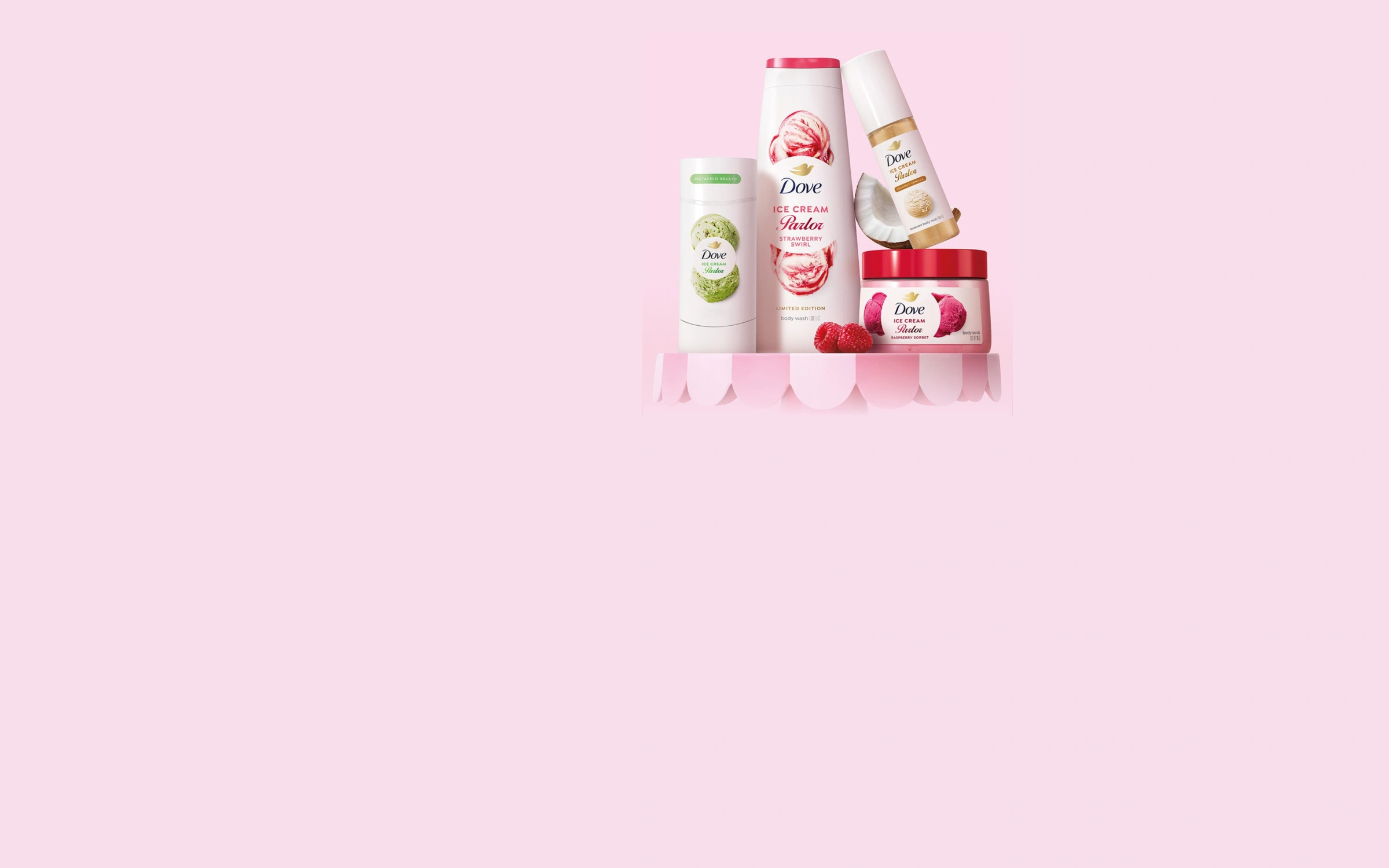Dove Ice Cream Parlor body wash, deodorant, body mist and body scrub on a pink scalloped stand