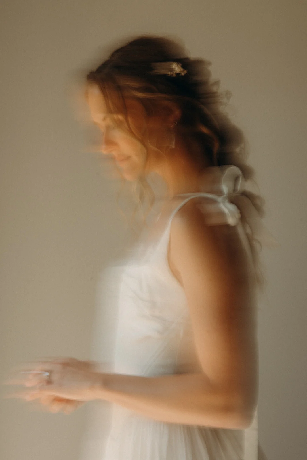 Warm, intentionally blurred bridal portrait from Theresa Fink’s archive