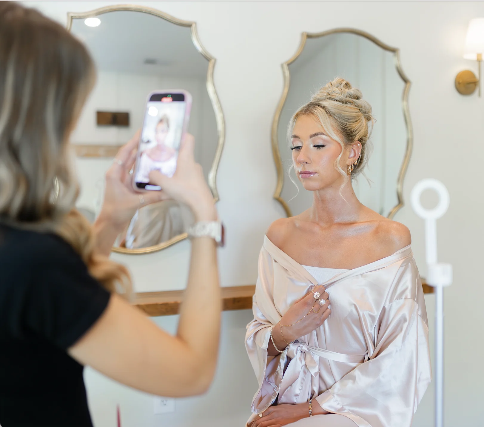 Becki filming a bride's makeup