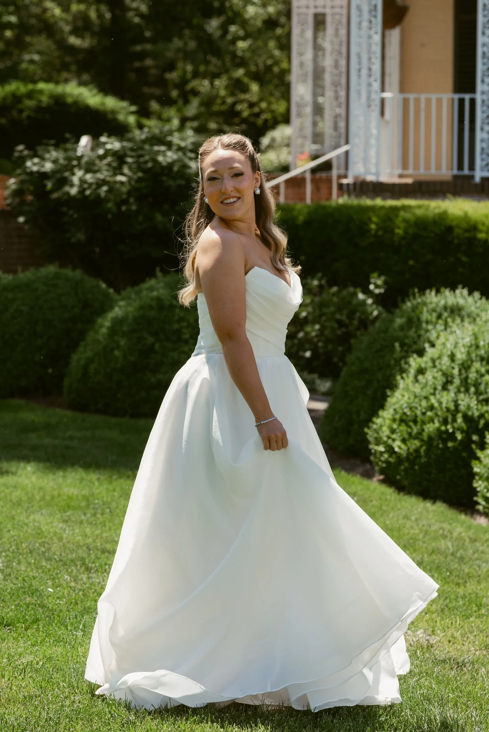 Smiling bride outdoors