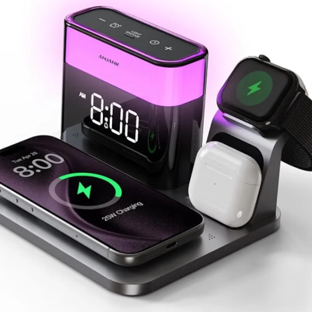 ANJANK GlowDock charging a phone, smartwatch, and wireless earbuds beside its illuminated clock