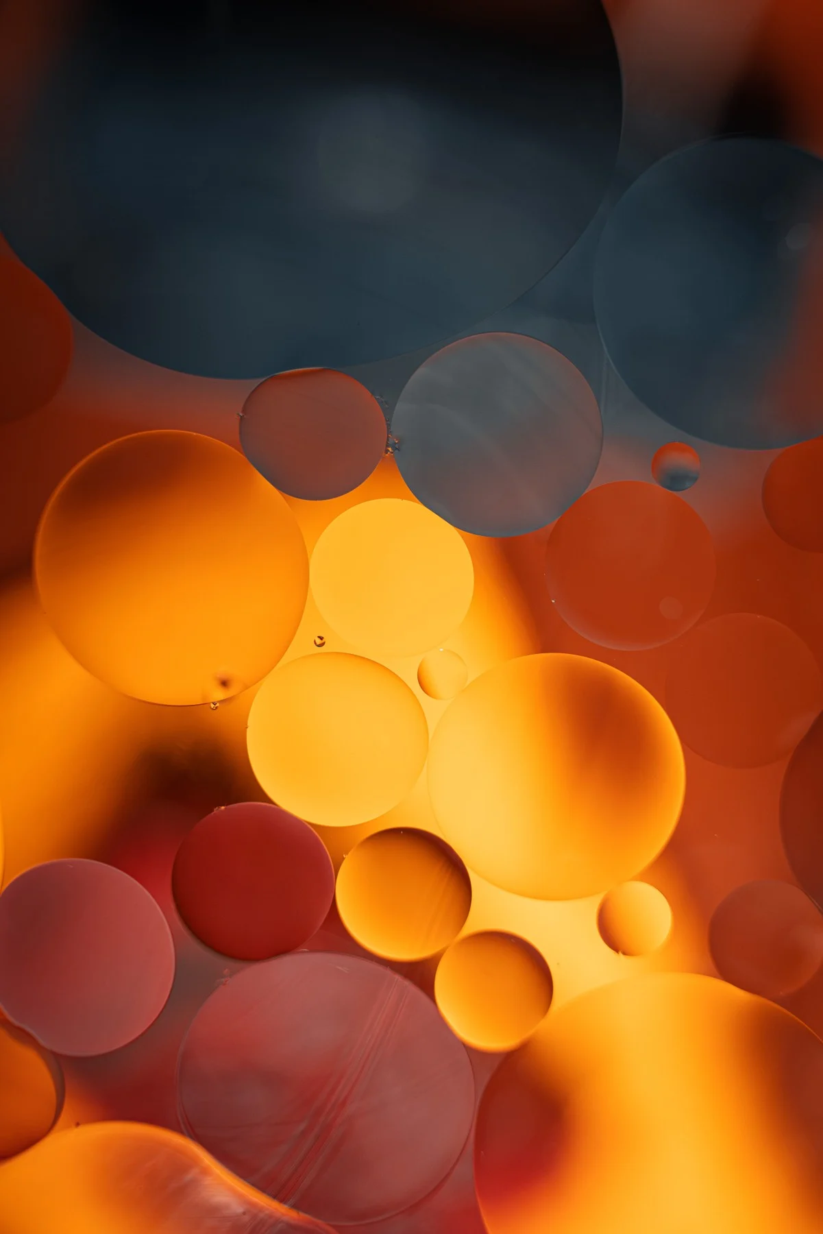 Abstract warm lights in red, amber, and charcoal