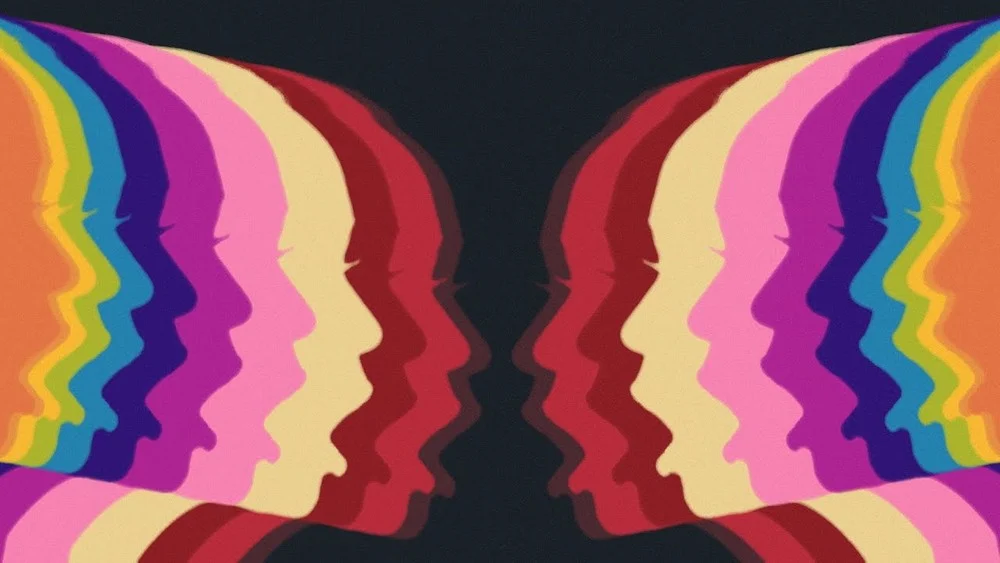 Mirrored rainbow-toned portraits from the Shadow Wall music video