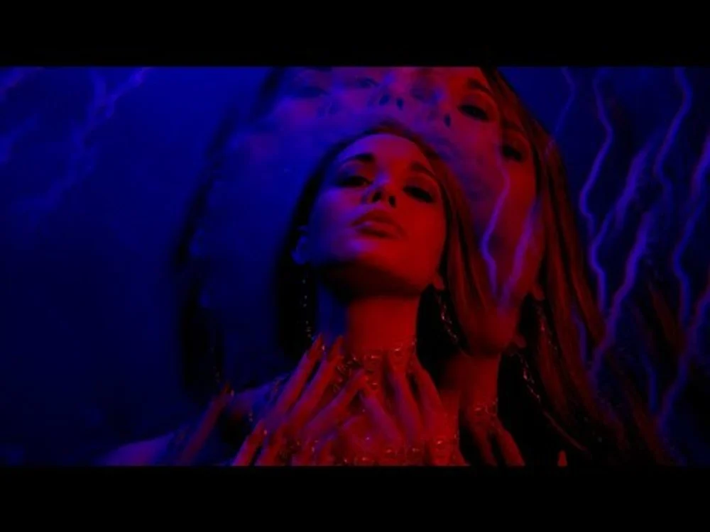 Mirrored red and blue portrait from the Scream music video