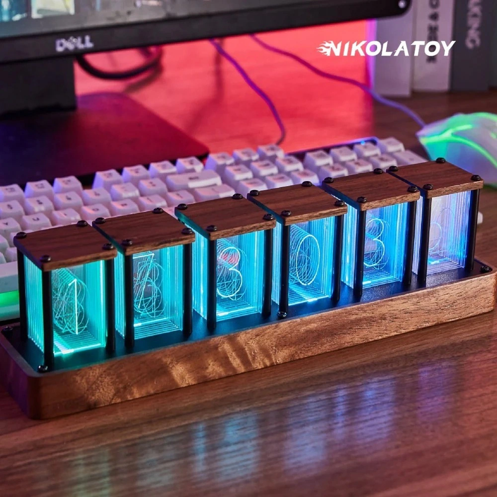 Nixie tube clock glowing in a walnut case