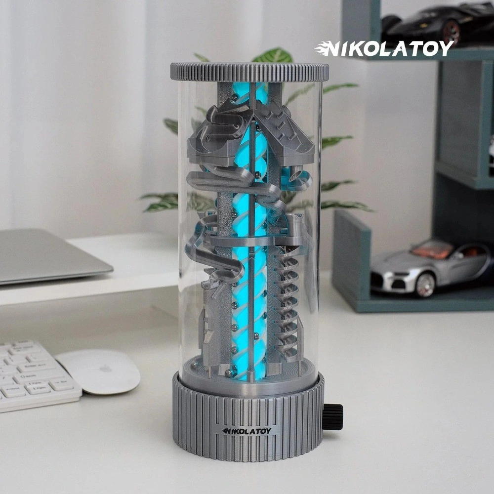 Glowing pinball desk light in a clear tube