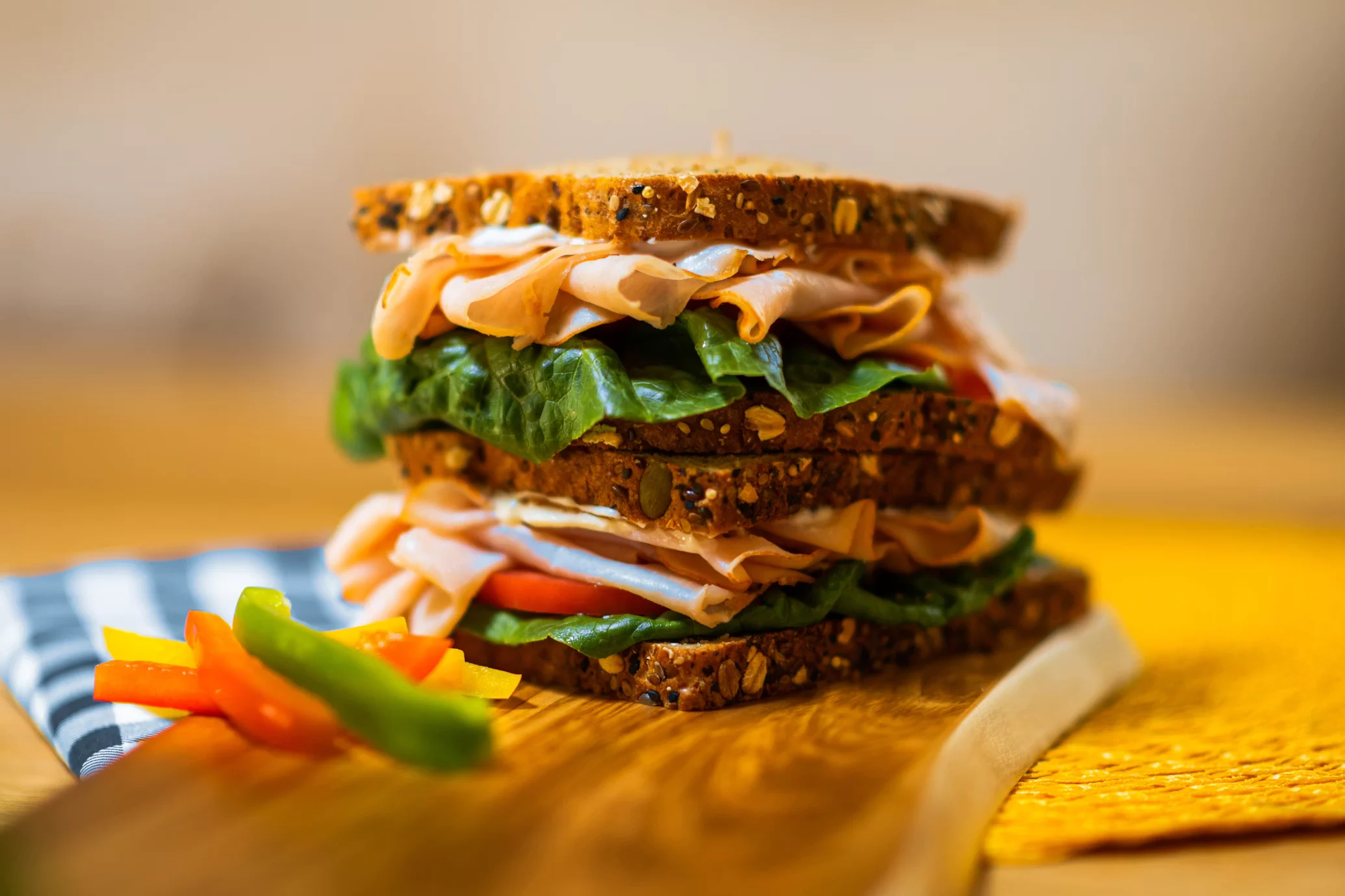 Roast chicken sandwich on a seeded roll