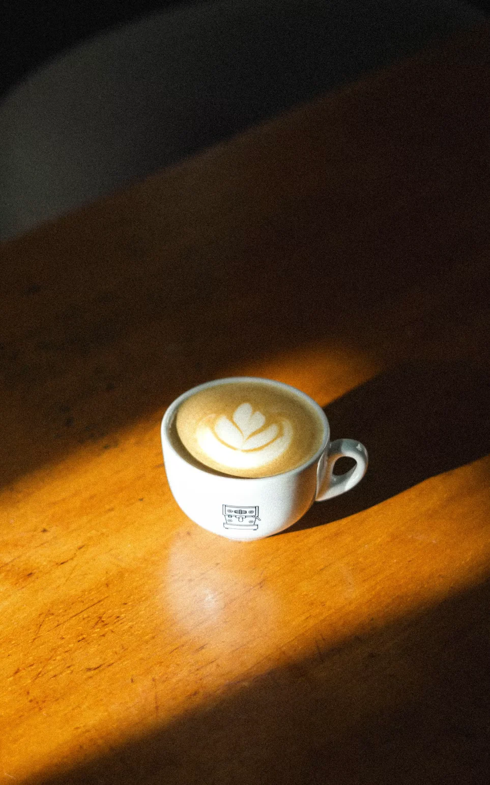 Orange blossom latte in a ceramic cup