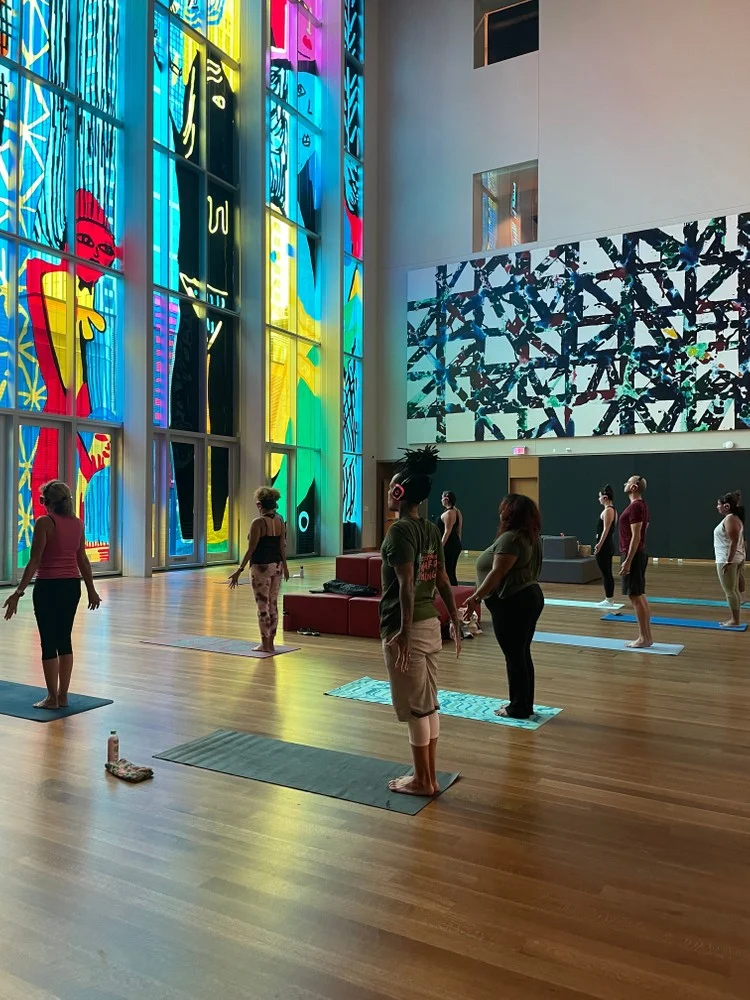 Dancing Lotus yoga class inside the Mint Museum Uptown