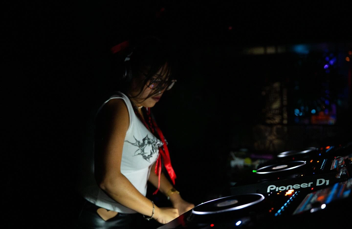 ANDG LUNA DJing under red and blue club lighting