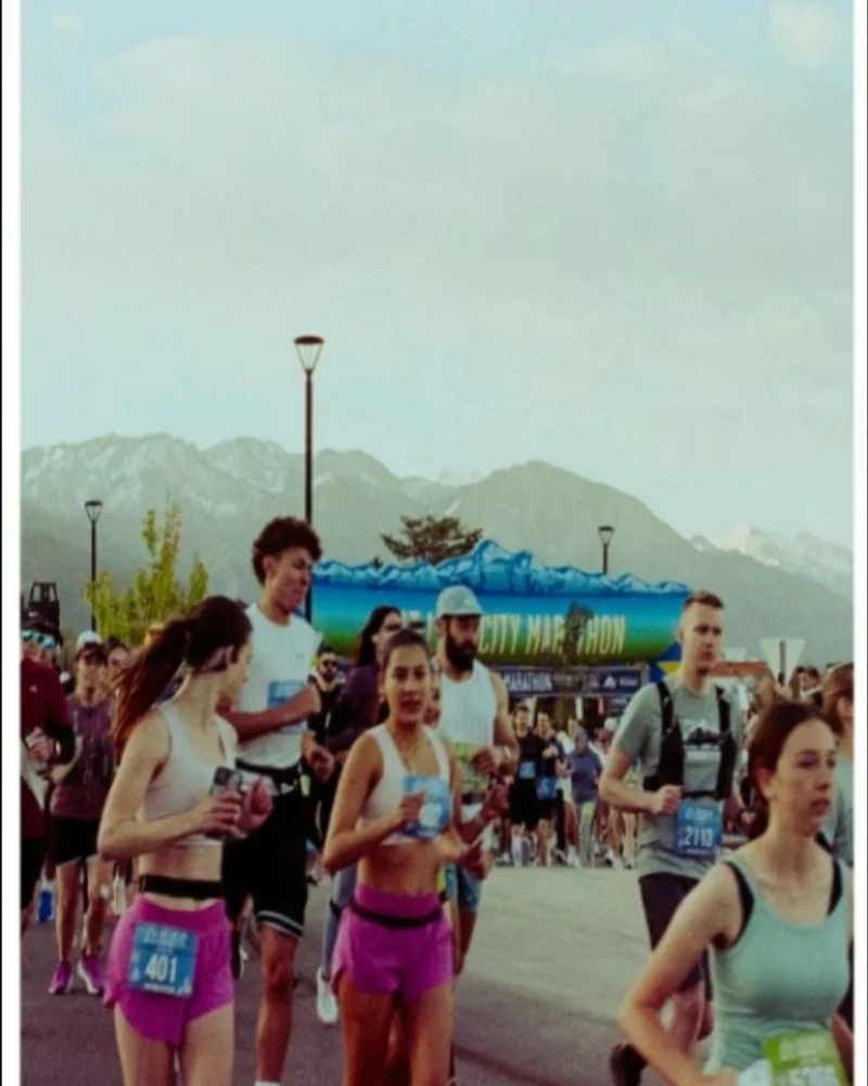 Film photograph of runners with mountains in the background
