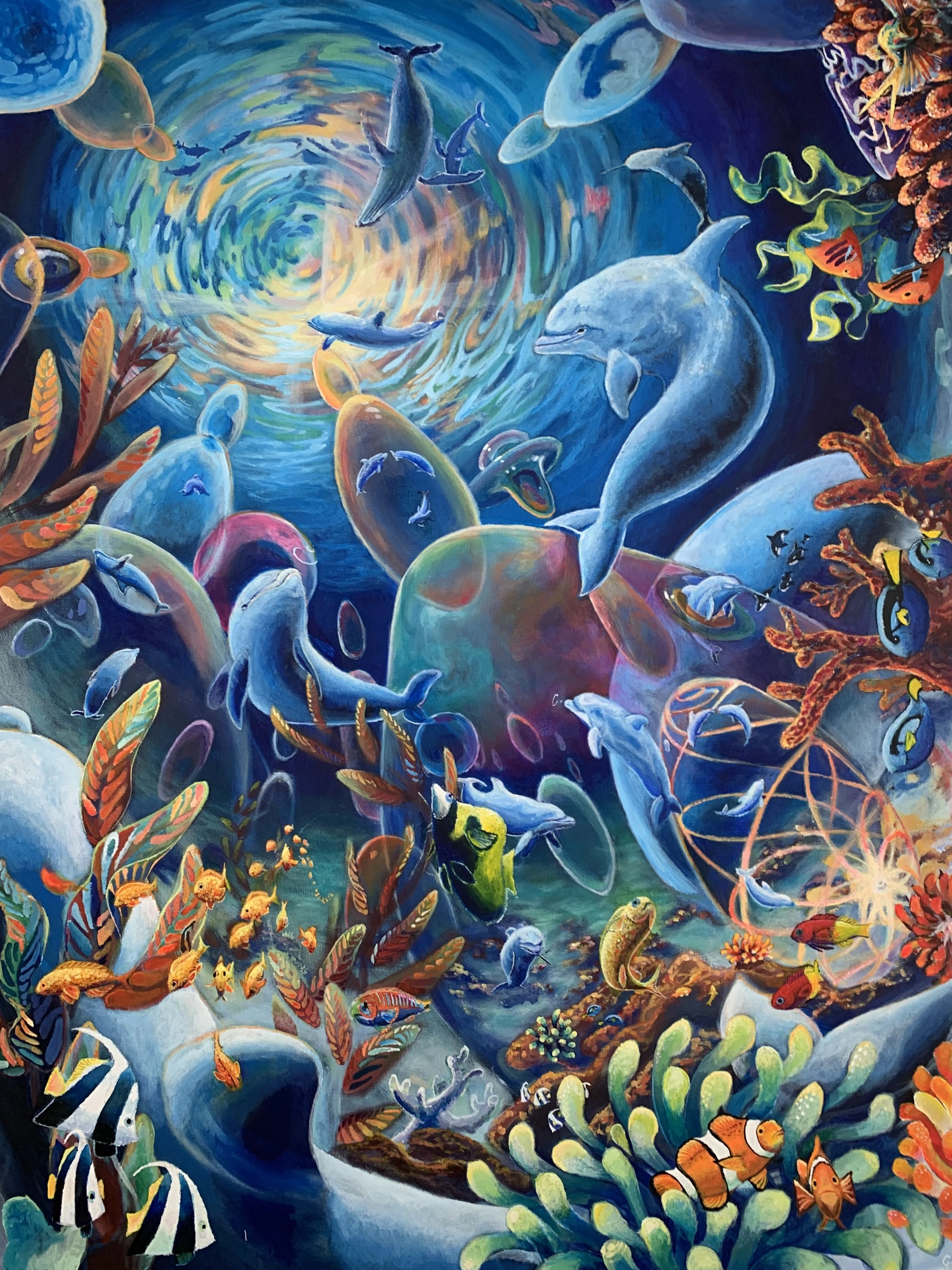 Resonance painting: dolphins, turtles and coral swirling in deep blue