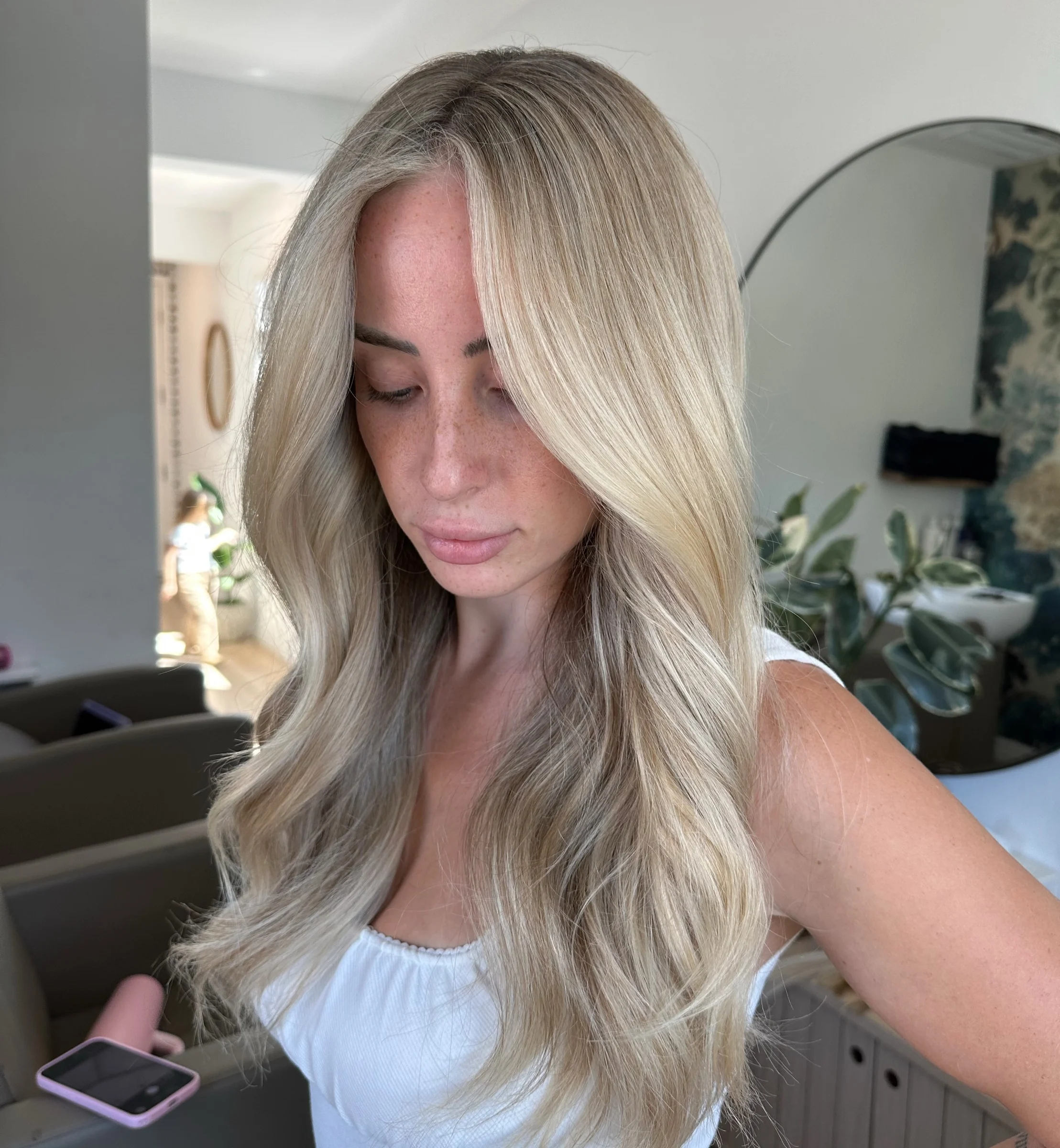 Bright, dimensional blonde with face-framing highlights