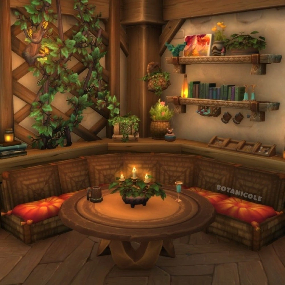 A cozy breakfast nook with a round table and red cushions