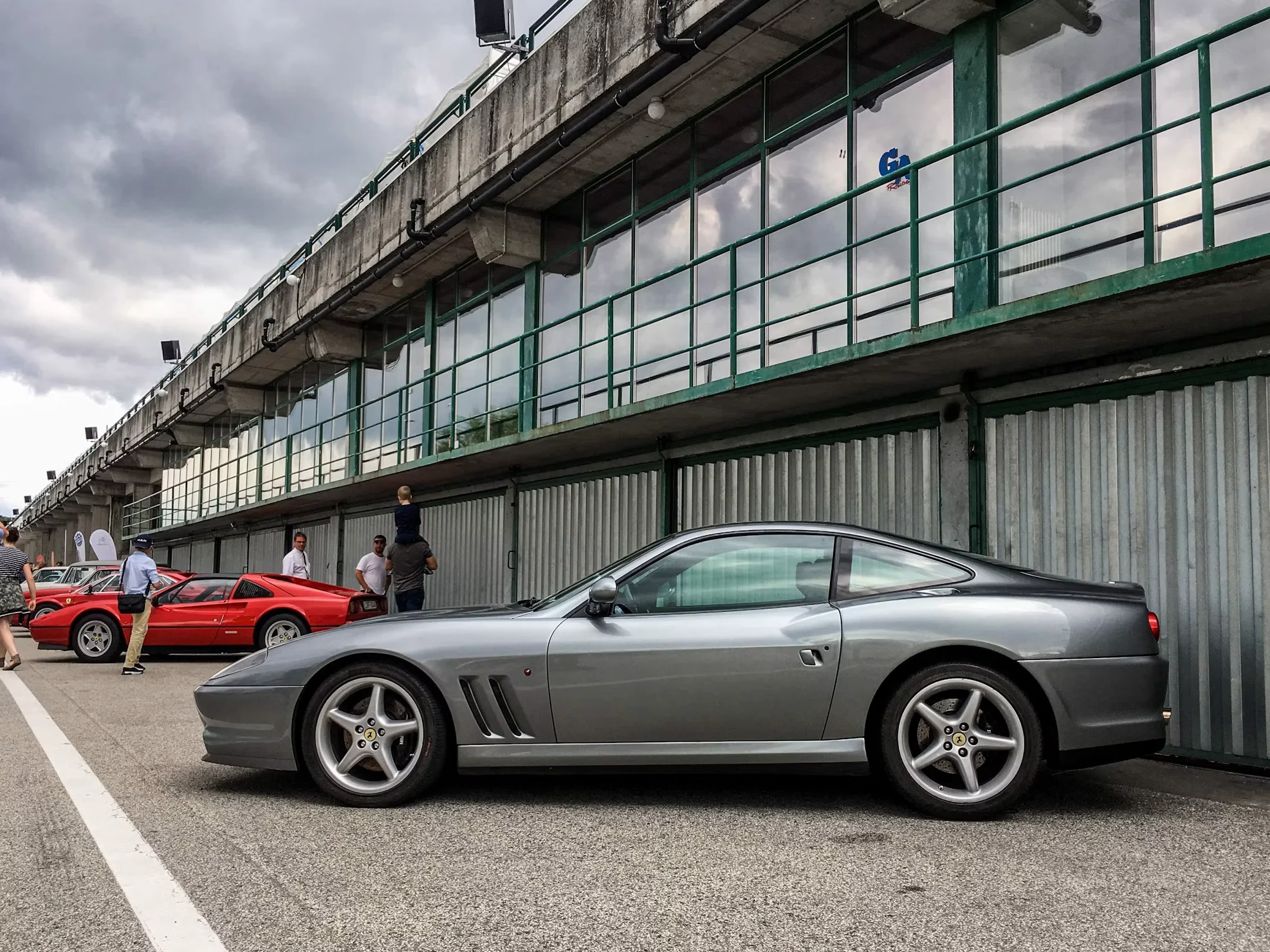 Silver Ferrari 550 Maranello on a quiet mountain road