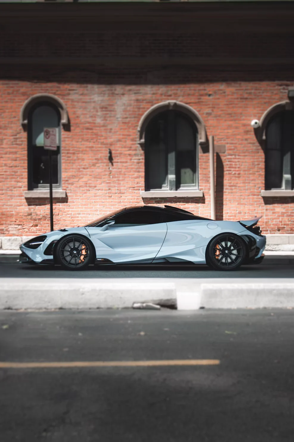 Grey McLaren 765LT viewed from the front three-quarter angle