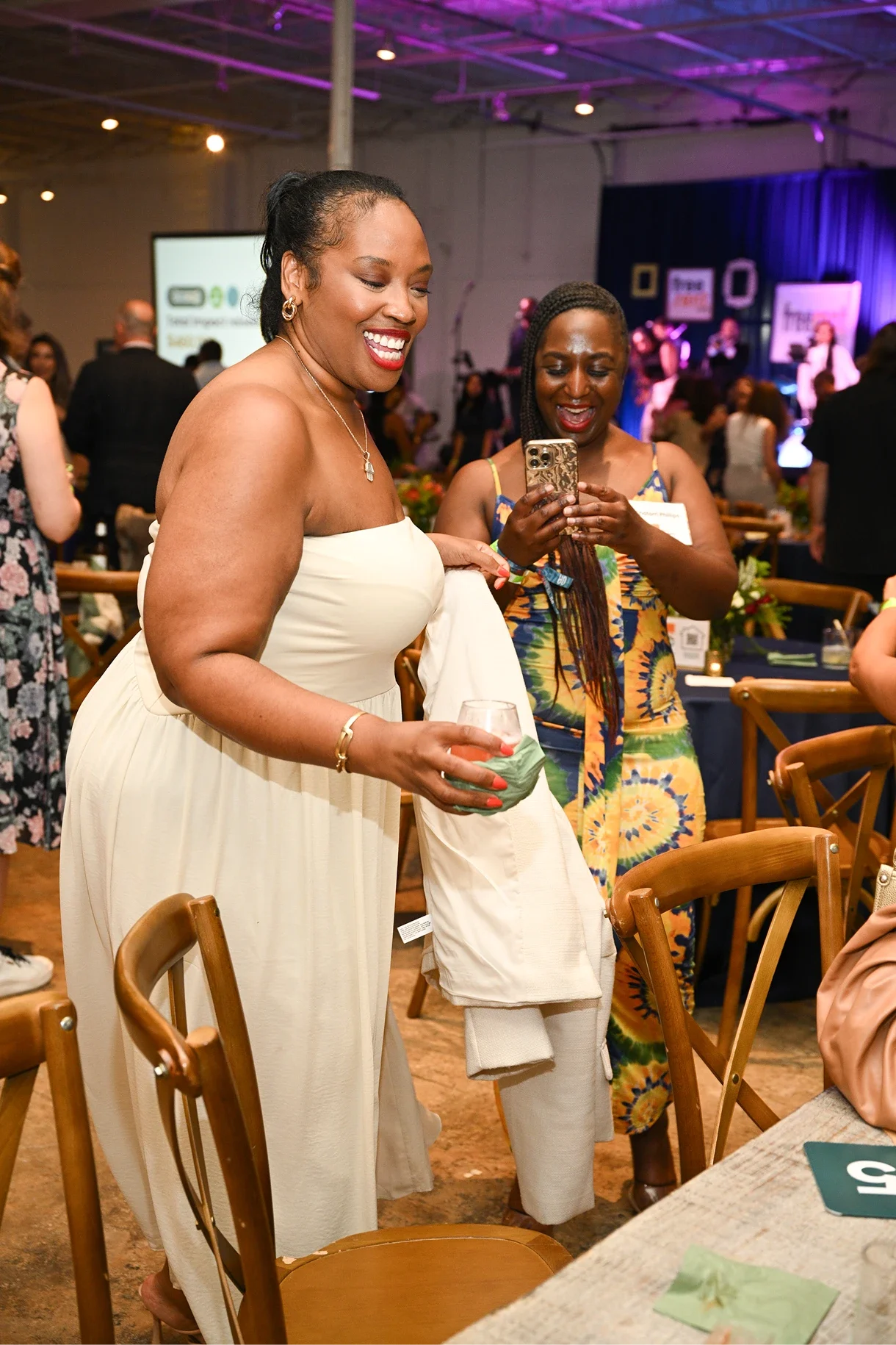 A smiling guest at a FreeRent fundraiser