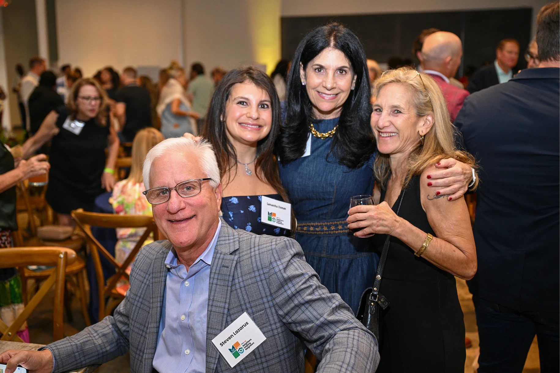 Supporters posing together at a FreeRent fundraiser