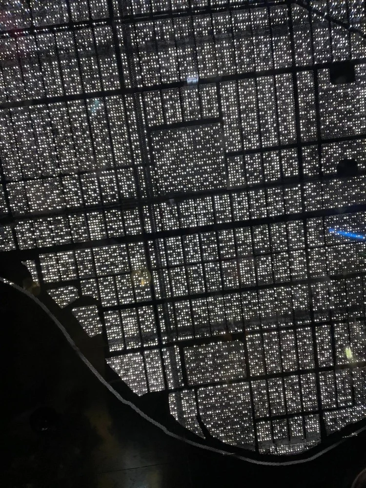 Illuminated geometric ceiling installation