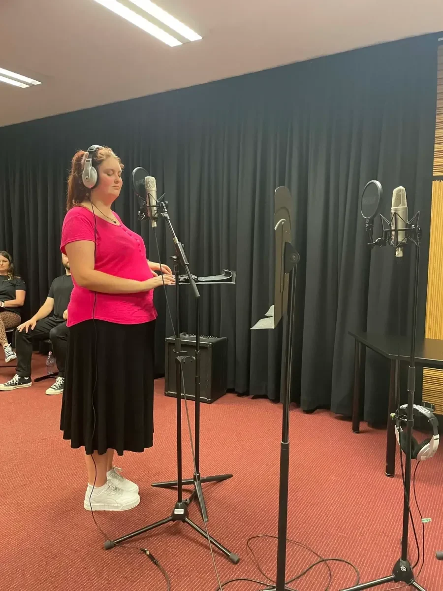 Kirsten Busby recording in a studio