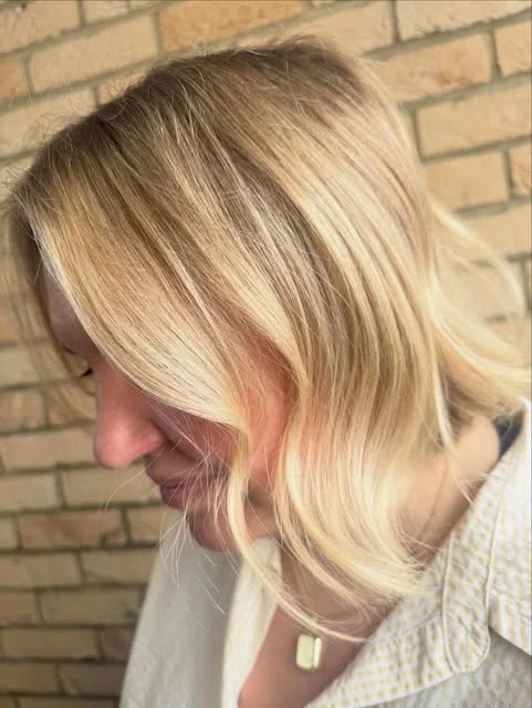 Soft low-maintenance blonde with a bright face frame and natural depth