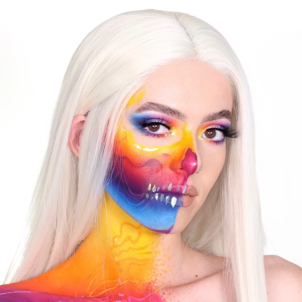 Piper Nelson in a vivid rainbow skull-inspired makeup transformation