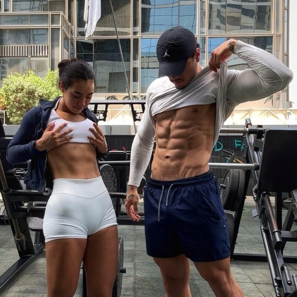 Coach Adrian and Coach Clarissa training together outdoors