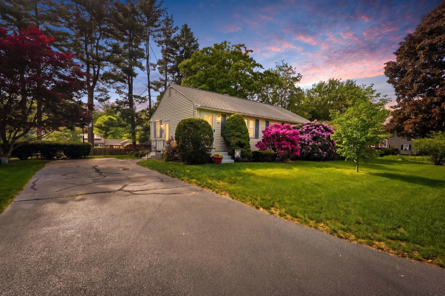 Ranch home at 28 Northway Dr in Springfield, MA at dusk