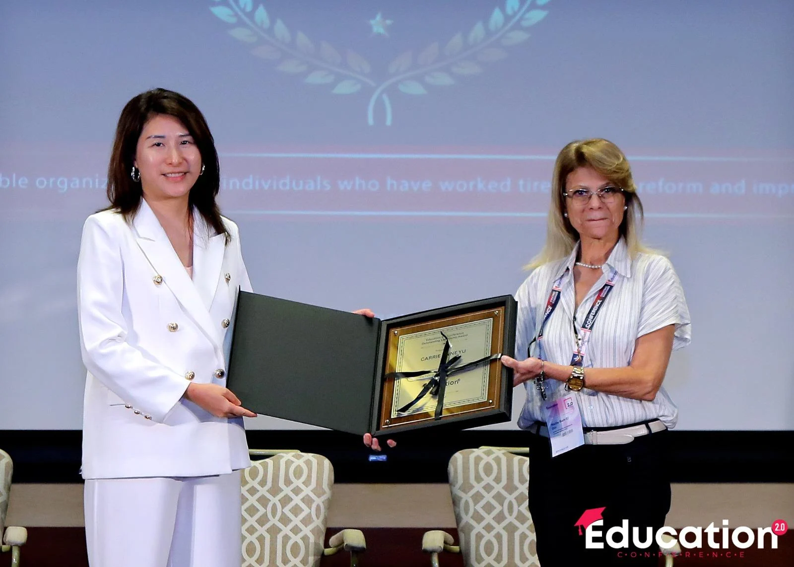 Carrie receiving the Outstanding Leadership Award at the Education 2.0 Conference