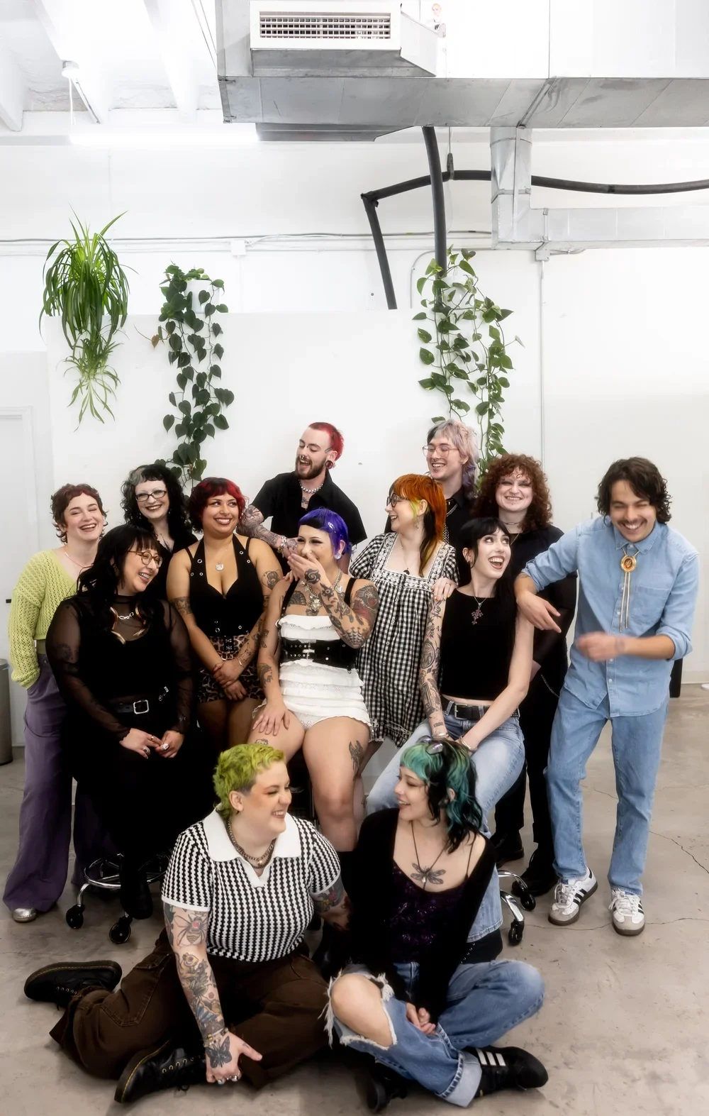 Charli and the Acute Salon team laughing together