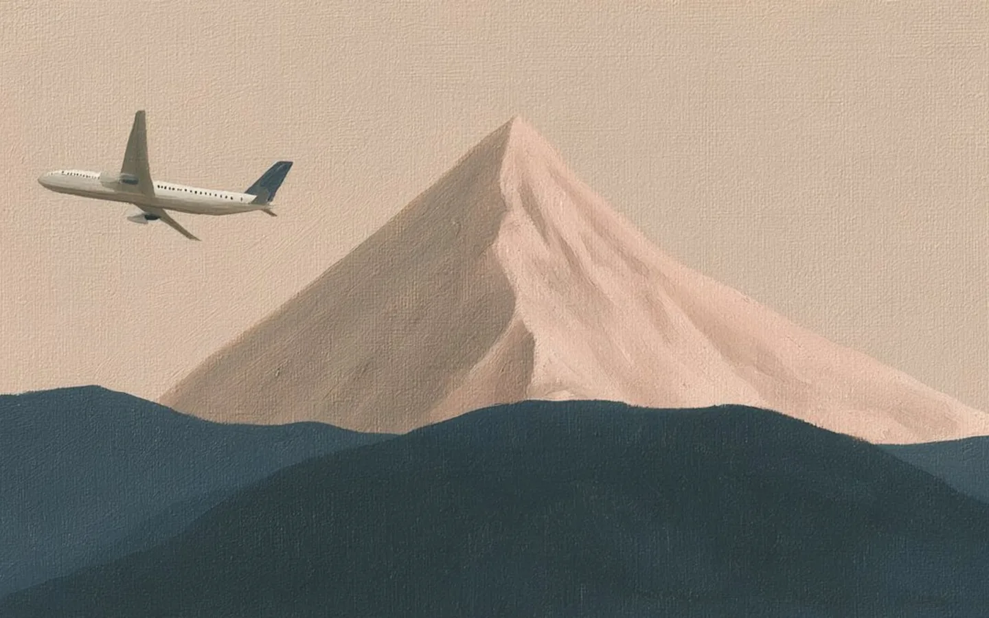 An airplane passing a softly painted mountain peak